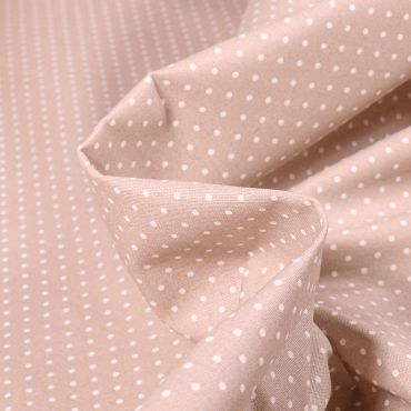 Coton enduit à pois blancs /rose 80% CO 20% PC 150cm